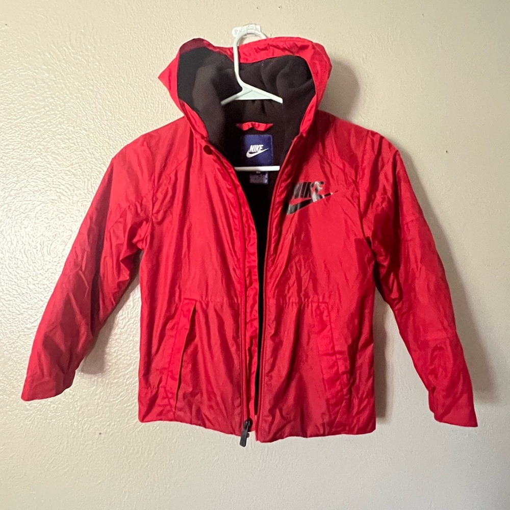 Nike boys fleece lined jacket, red with black lining, size 7, fairly worn